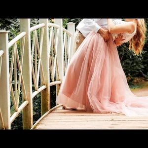 Pink skirt - size medium but could Easily fit XS to Large it has stretchy band